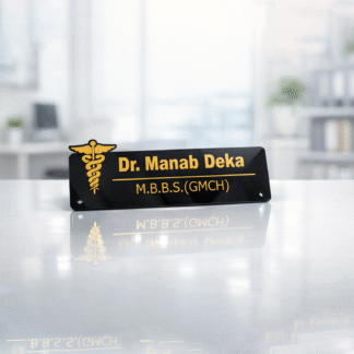 black doctor name plate with gold text for clinic desk